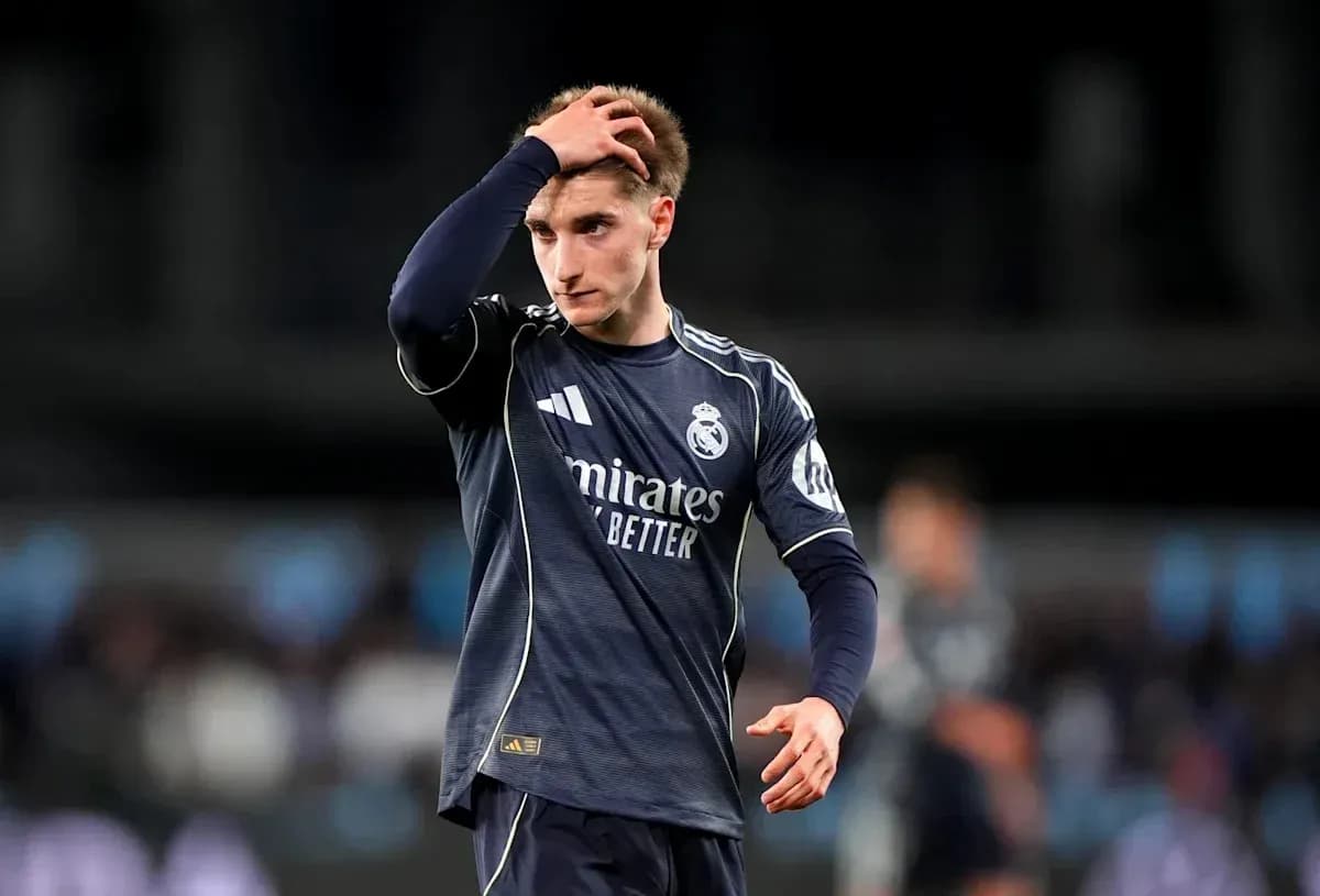 Player in Real Madrid kit walking on field Player in Real Madrid kit walking on field