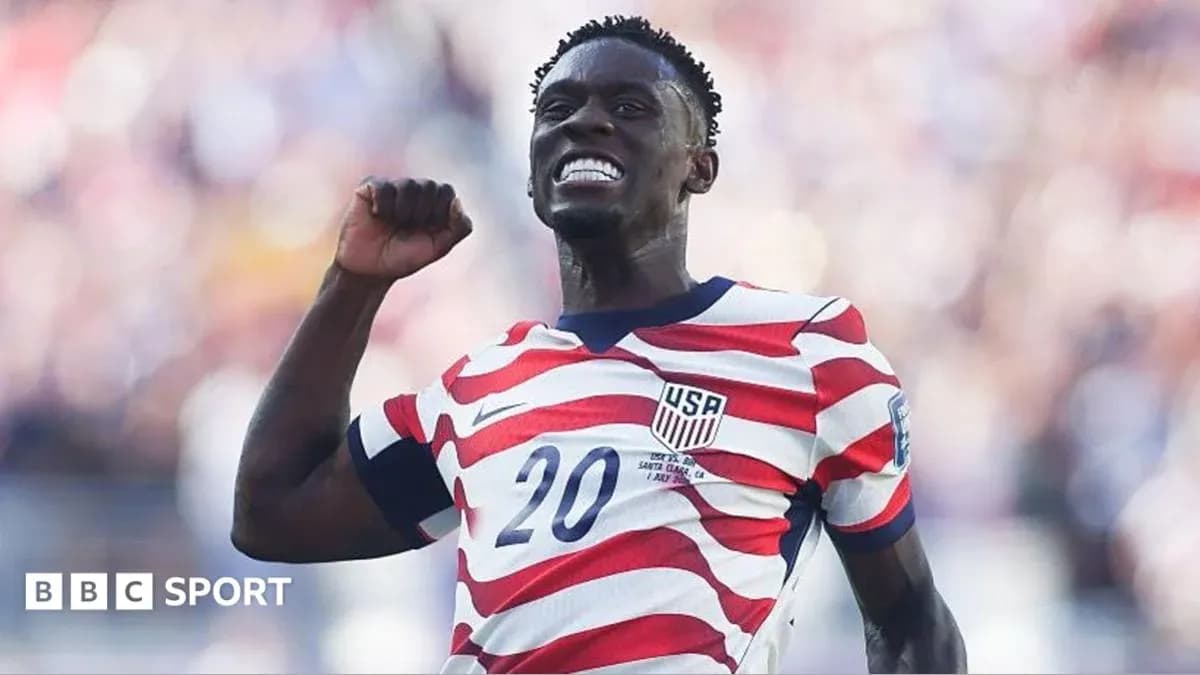 Player celebrating a goal wearing USA jersey Player celebrating a goal wearing USA jersey