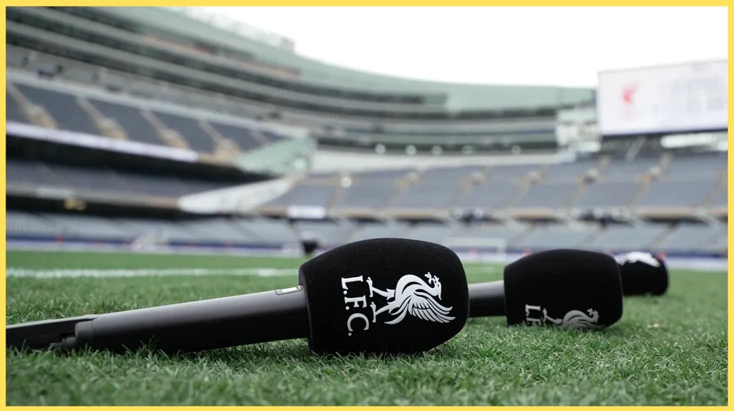 Microphones with Liverpool FC logo on pitch Microphones with Liverpool FC logo on pitch