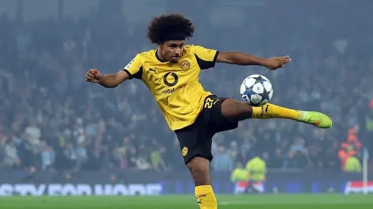 Player kicking ball during UEFA Champions League match Player kicking ball during UEFA Champions League match