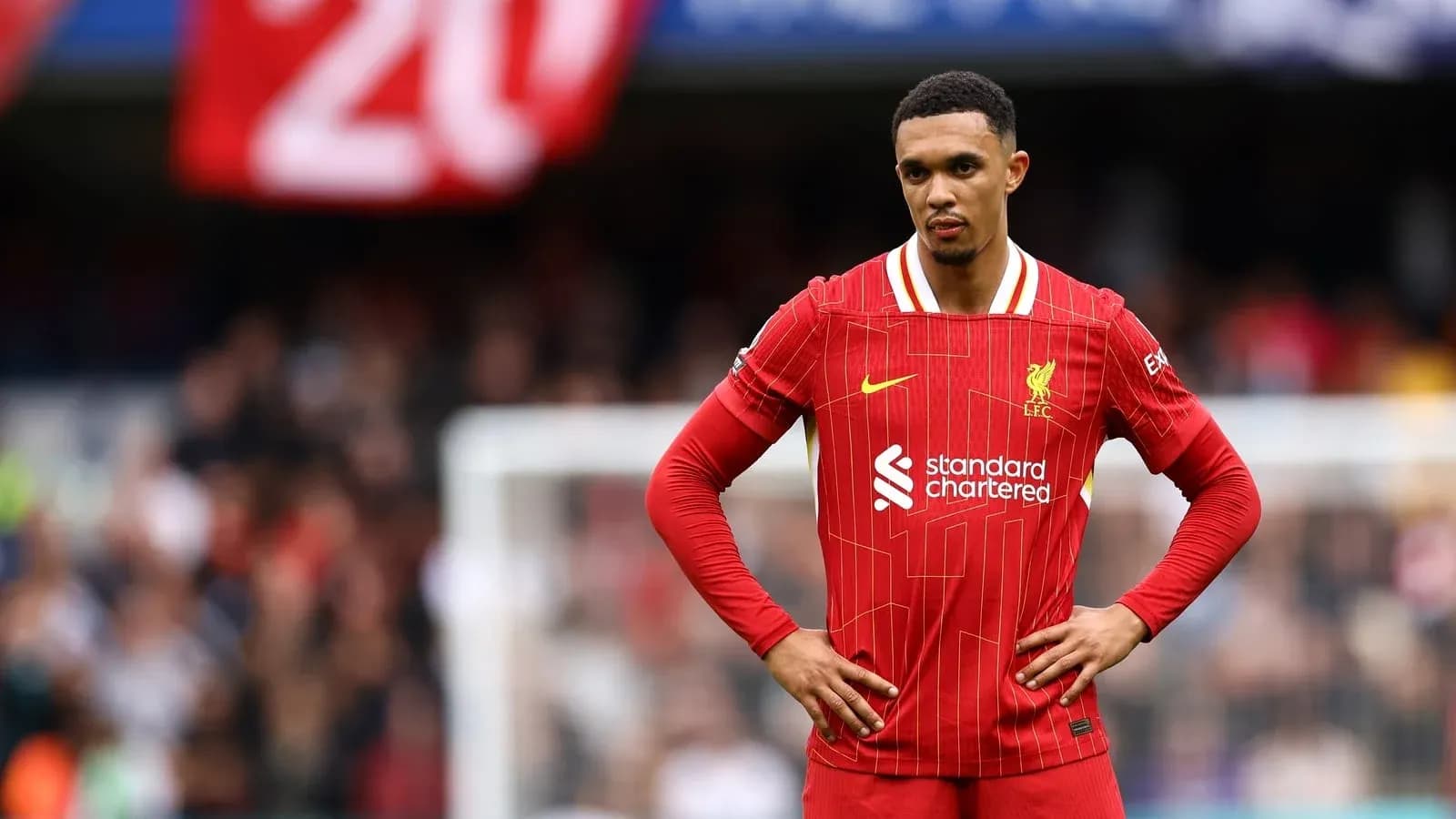 Trent Alexander-Arnold in Liverpool jersey on field Trent Alexander-Arnold in Liverpool jersey on field
