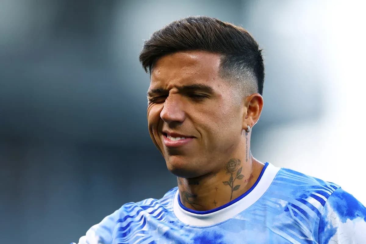 Player with tattoos preparing for match Player with tattoos preparing for match