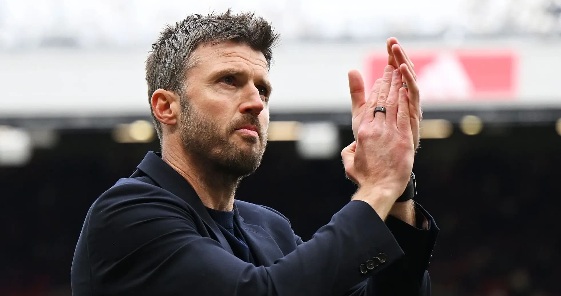 Manager applauding fans at the stadium Manager applauding fans at the stadium
