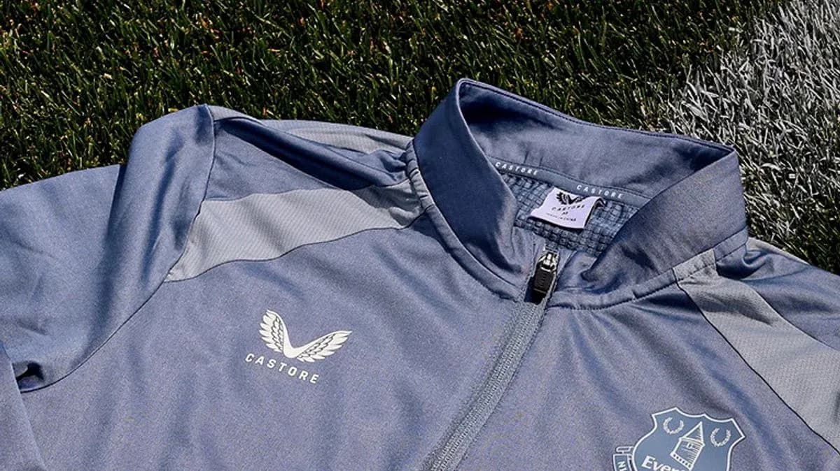 Close-up of Everton training jacket on grass Close-up of Everton training jacket on grass