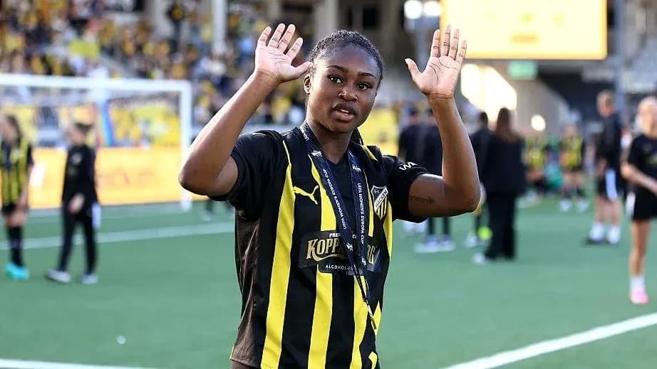 Player waving on the field after match celebration Player waving on the field after match celebration