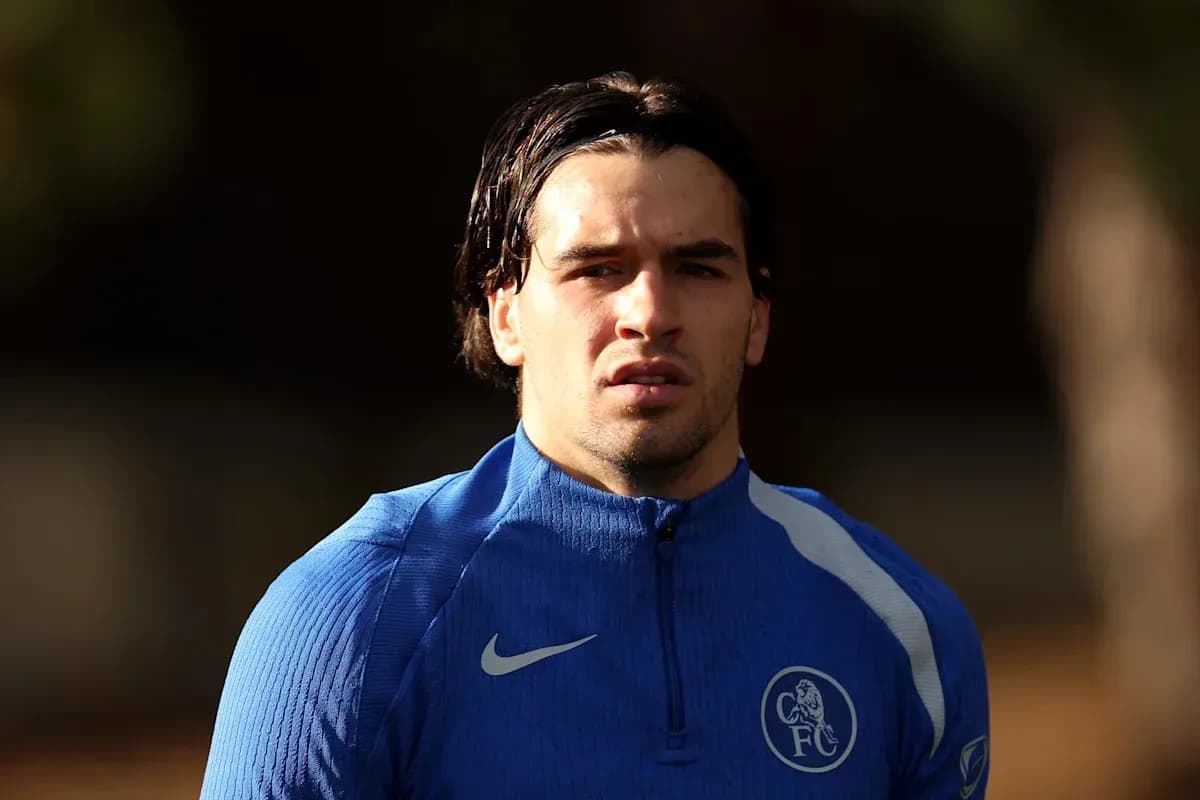 Player in blue training gear during practice session Player in blue training gear during practice session