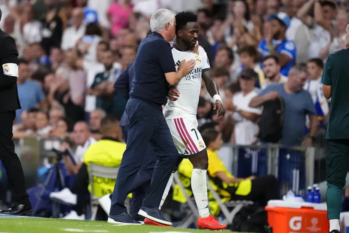 Coach interacting with player during match substitution Coach interacting with player during match substitution