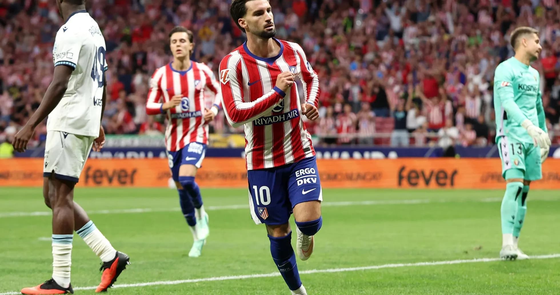 Atletico Madrid player celebrating goal against Osasuna Atletico Madrid player celebrating goal against Osasuna