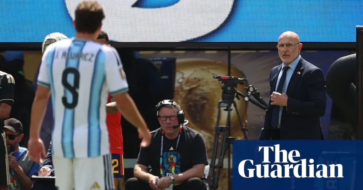 Argentina player substituted during match with coach observing Argentina player substituted during match with coach observing