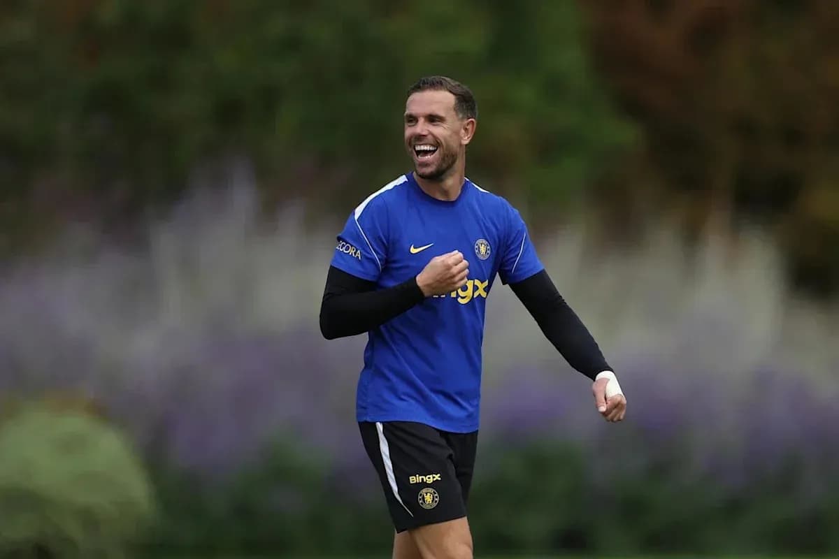 Player smiling during training session in blue kit Player smiling during training session in blue kit