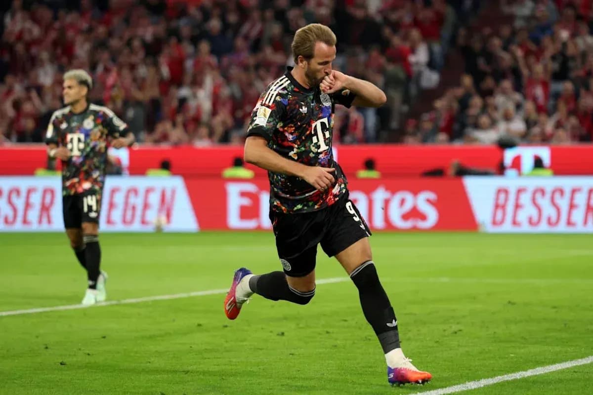 Player celebrating goal during a football match Player celebrating goal during a football match