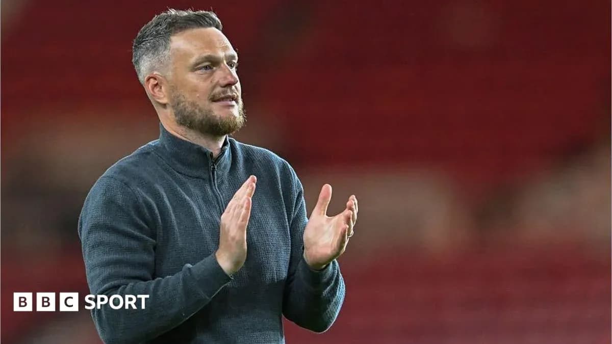 Coach applauding after match at stadium Coach applauding after match at stadium