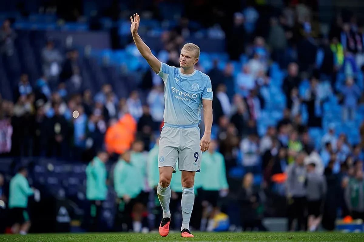 Player waving to fans after the match Player waving to fans after the match