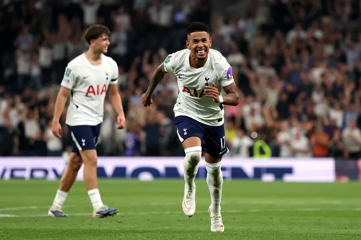 Player celebrating a goal with teammates during match Player celebrating a goal with teammates during match