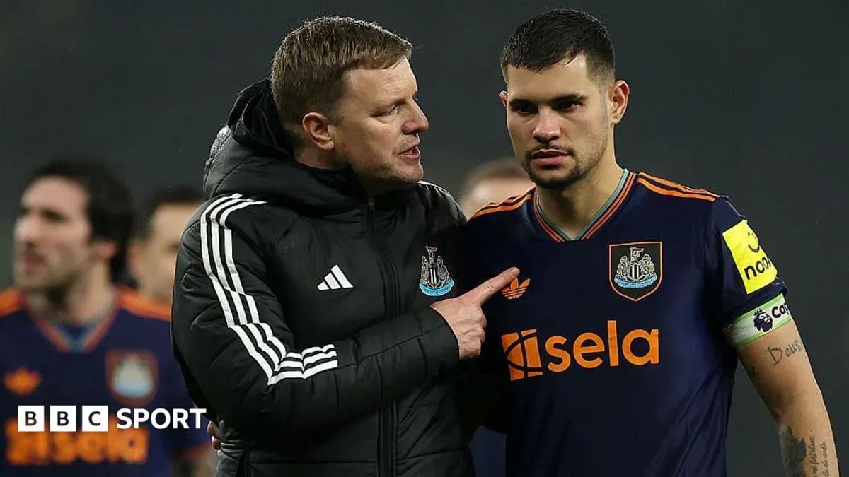 Coach discussing strategy with player after match Coach discussing strategy with player after match