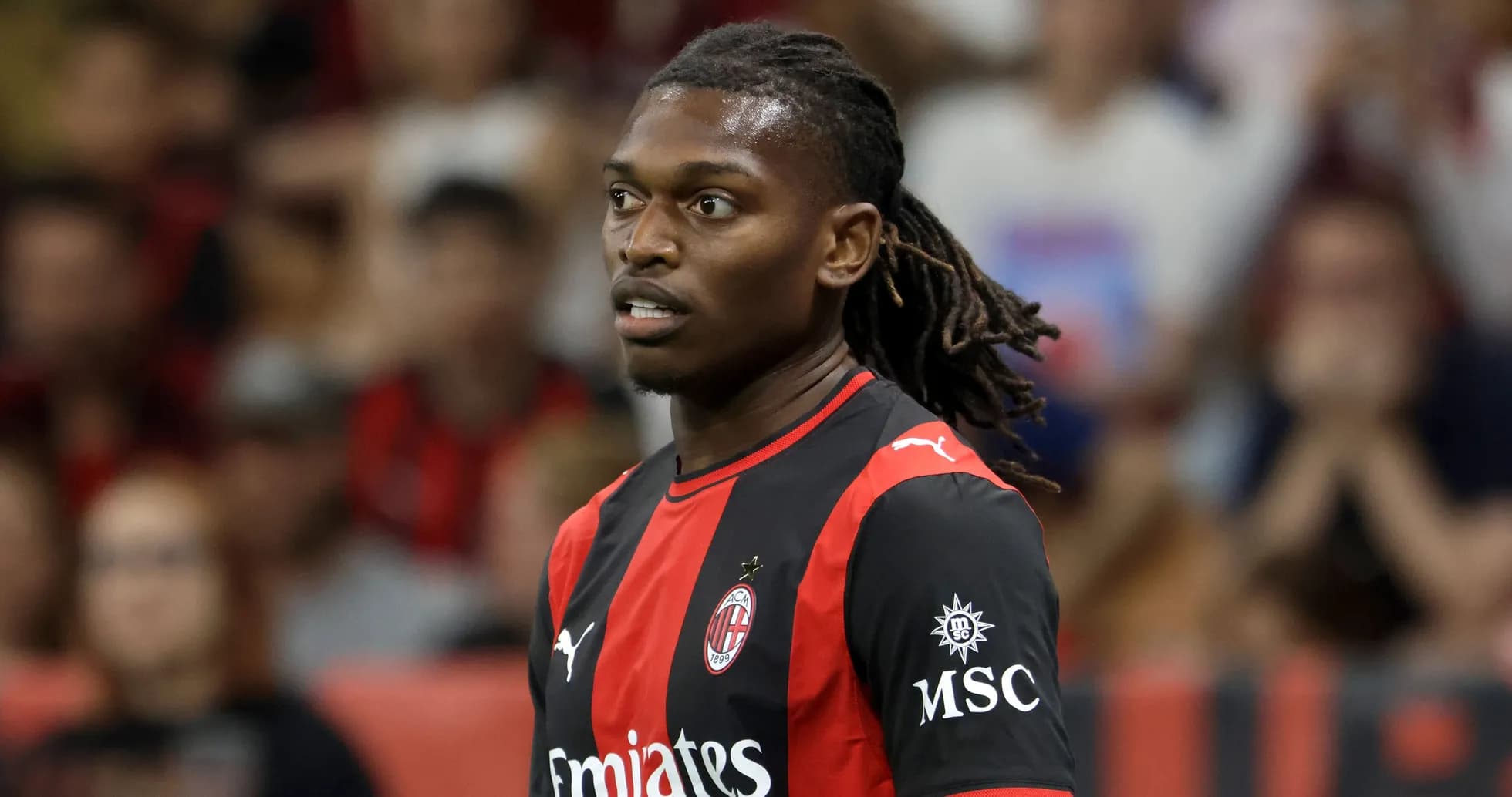 Player wearing AC Milan jersey during match Player wearing AC Milan jersey during match