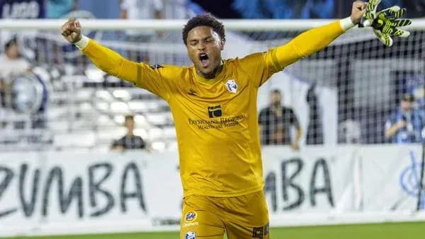 Goalkeeper celebrating after a successful save Goalkeeper celebrating after a successful save