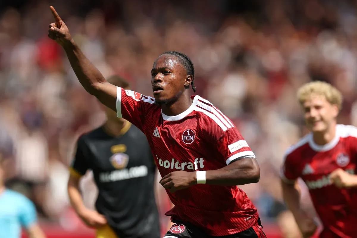 Player celebrating goal with raised finger during match Player celebrating goal with raised finger during match