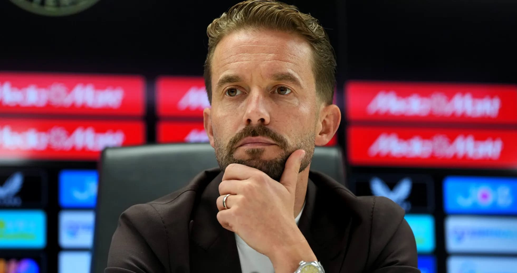 Manager speaking during a press conference Manager speaking during a press conference