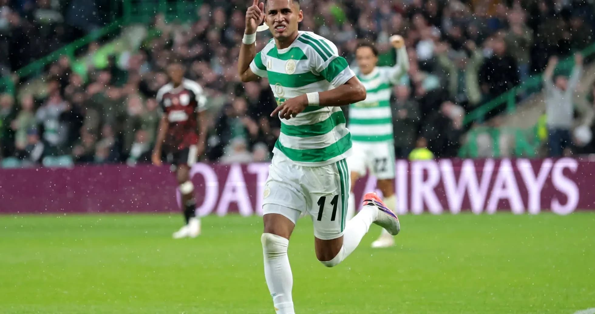 Celtic player celebrating goal during match Celtic player celebrating goal during match