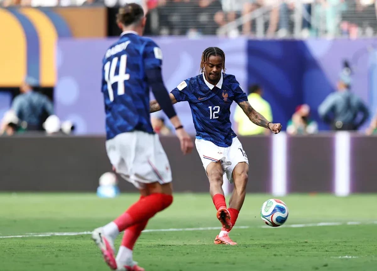 French player kicking ball during match French player kicking ball during match