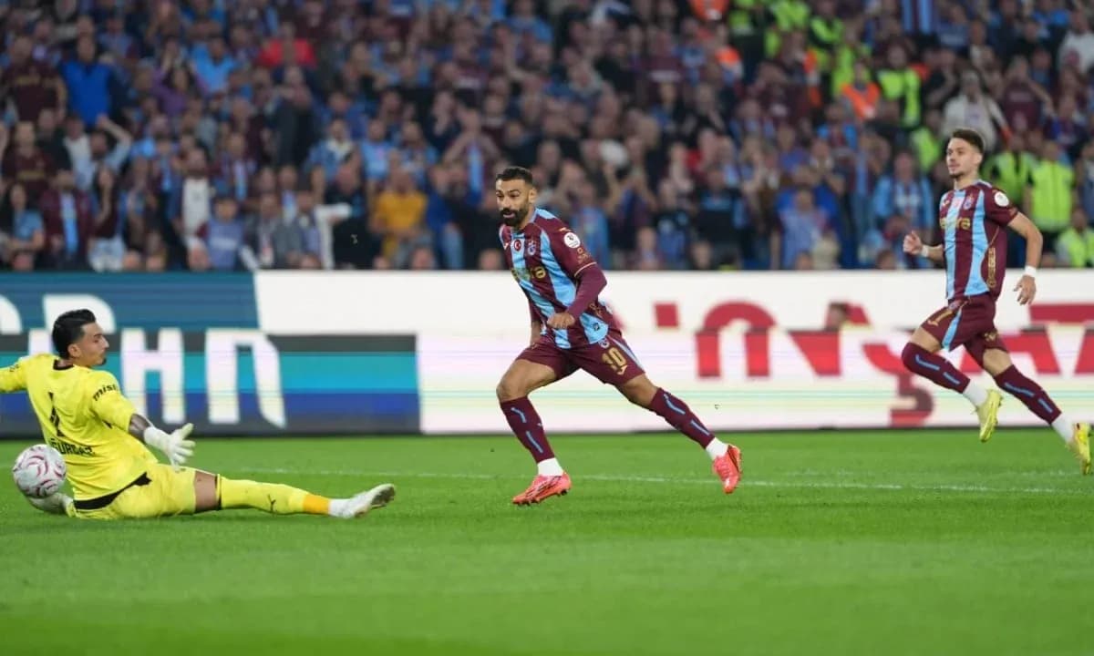 Player scoring against the goalkeeper during match Player scoring against the goalkeeper during match