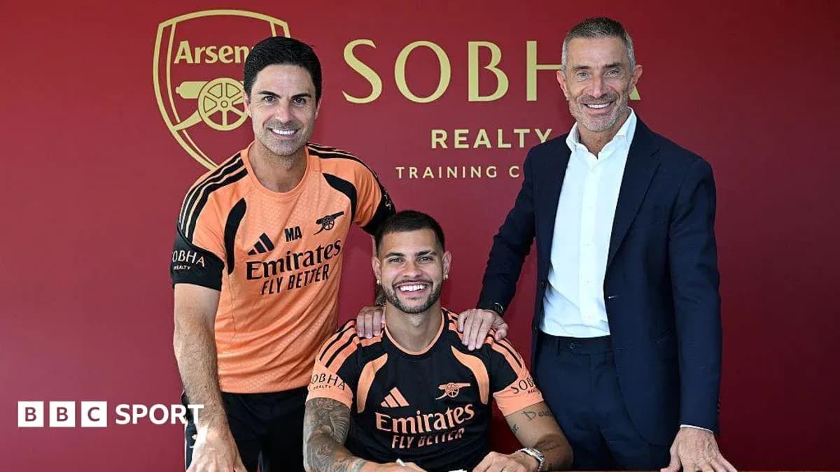 Manager and players at Arsenal signing event Manager and players at Arsenal signing event