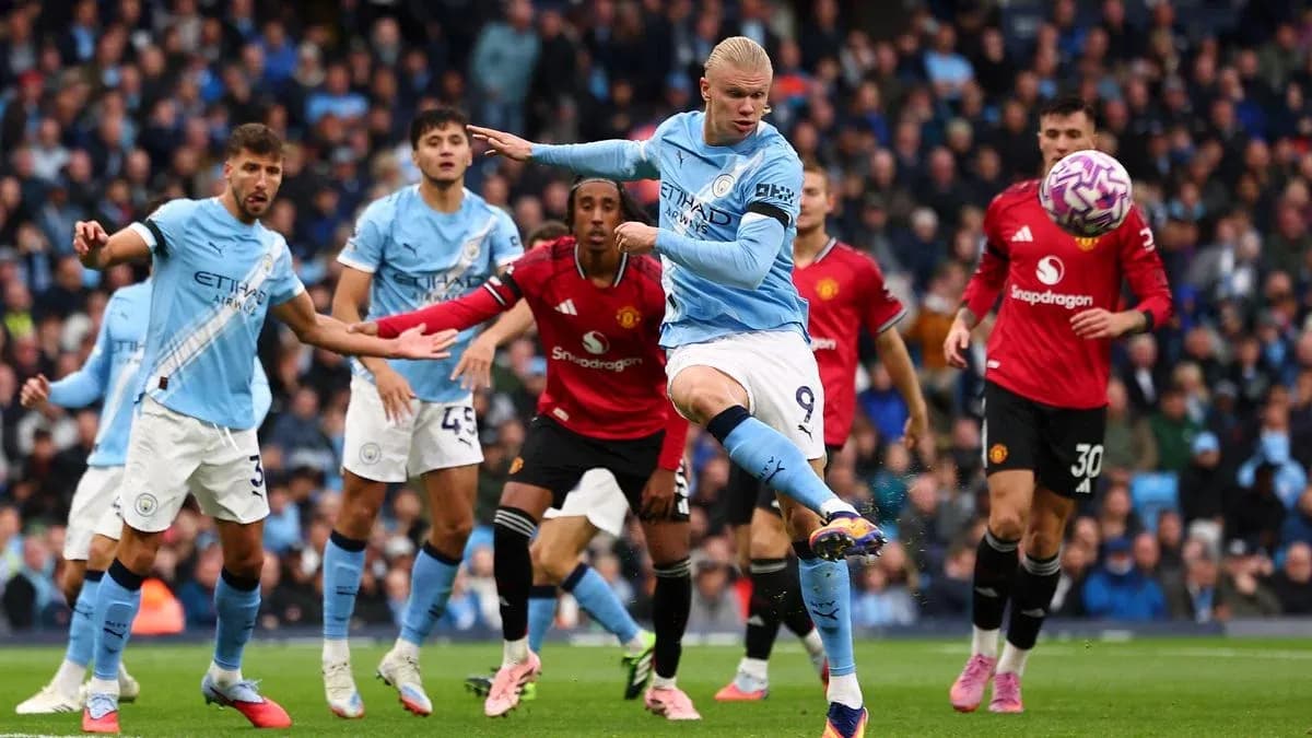 Erling Haaland kicking the ball in Manchester derby Erling Haaland kicking the ball in Manchester derby
