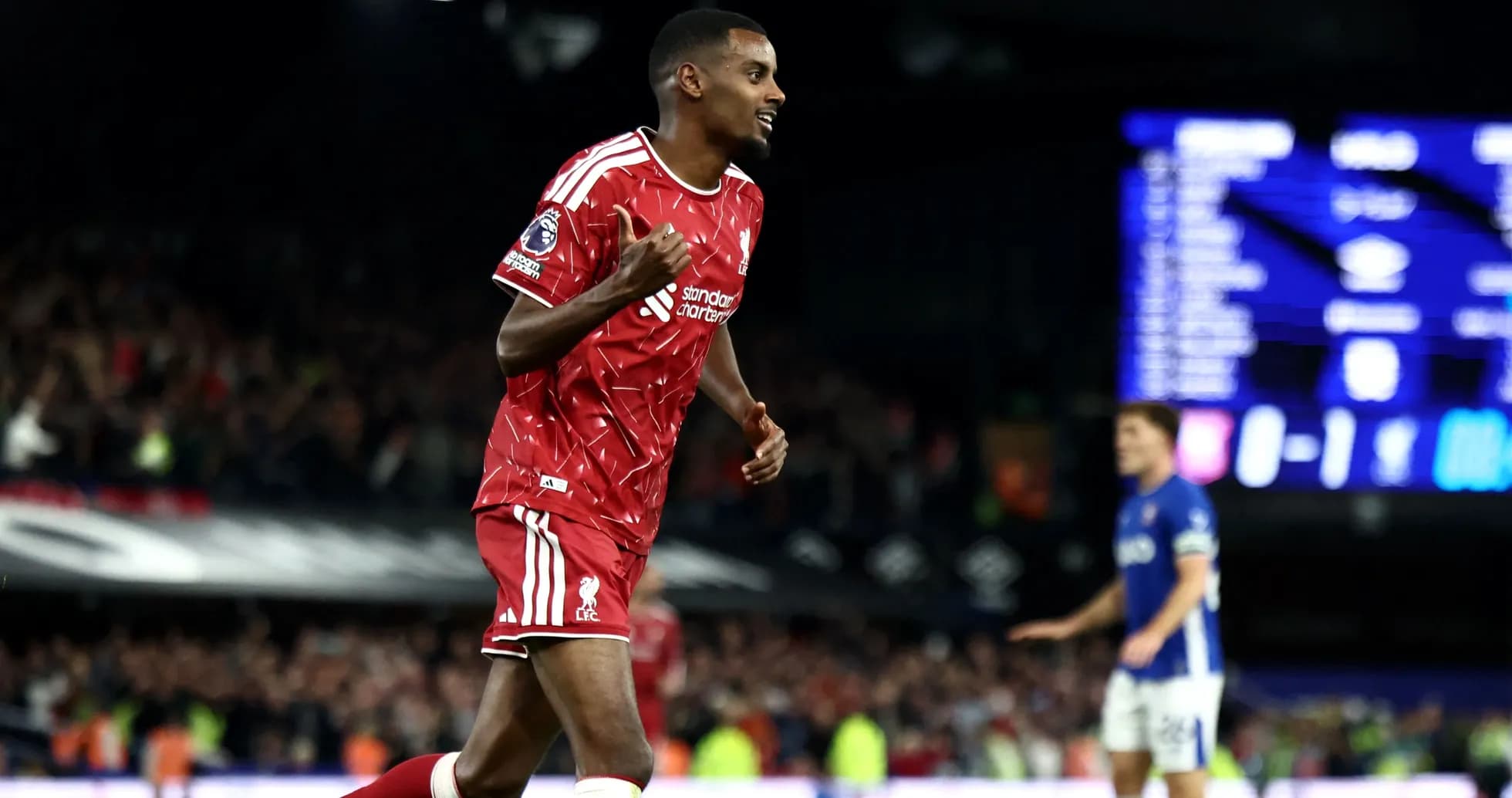 Player celebrating after scoring for Liverpool during match Player celebrating after scoring for Liverpool during match