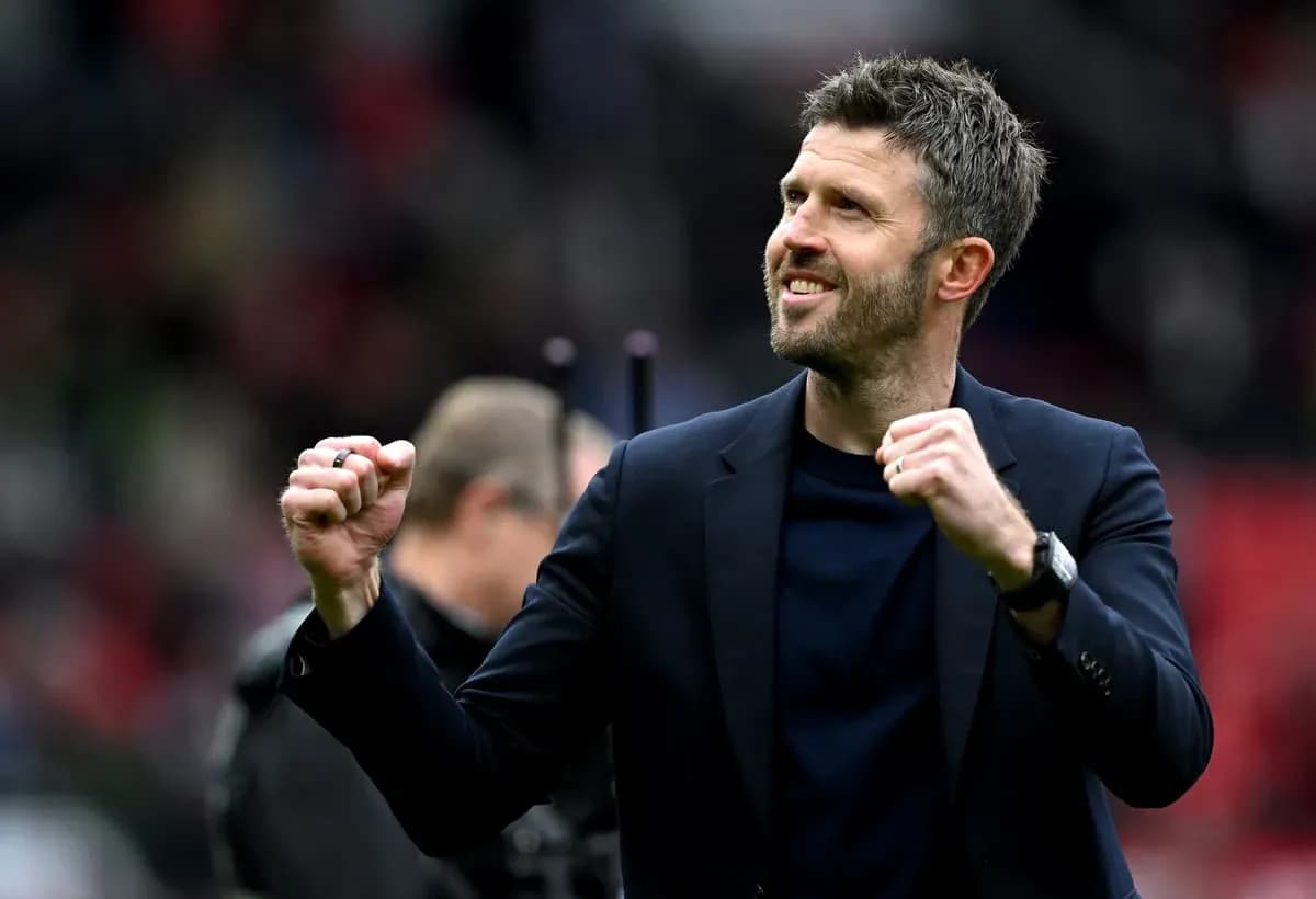 Coach celebrating with clenched fist at stadium Coach celebrating with clenched fist at stadium