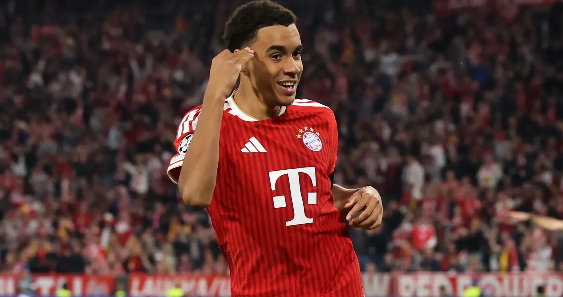 Player celebrating after scoring a goal for Bayern Munich Player celebrating after scoring a goal for Bayern Munich