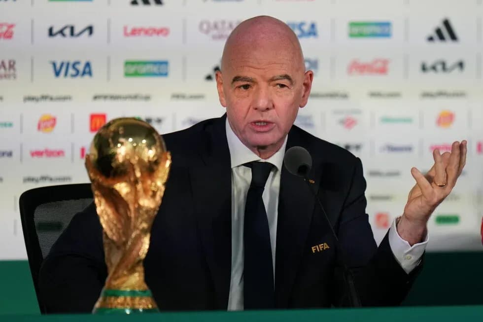 FIFA president speaking at press conference with trophy FIFA president speaking at press conference with trophy