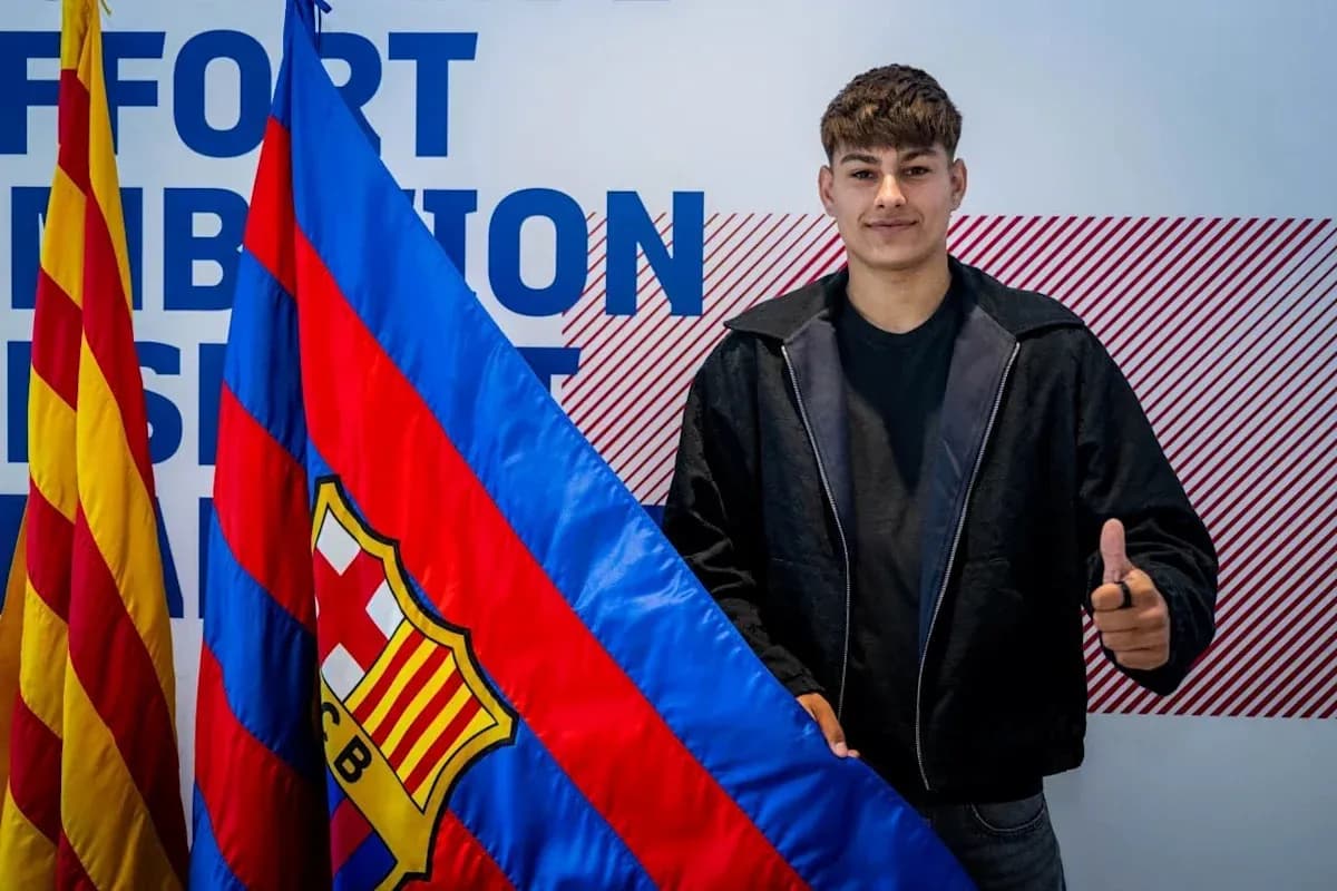 Player posing with FC Barcelona flag and thumbs up Player posing with FC Barcelona flag and thumbs up