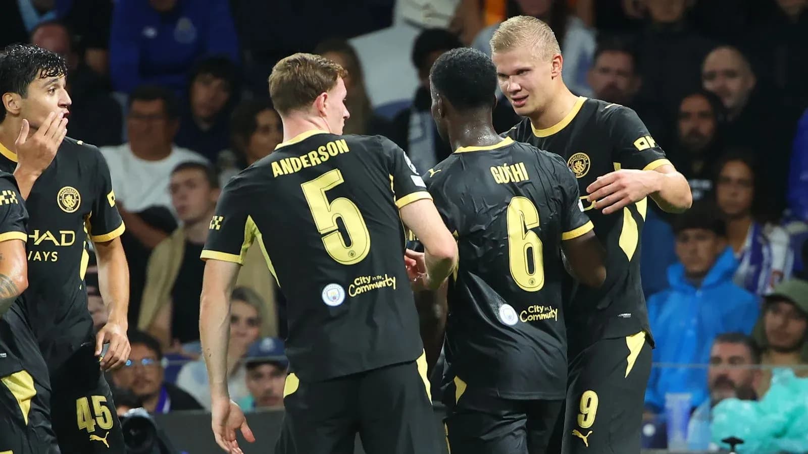 Manchester City players celebrating on the field Manchester City players celebrating on the field