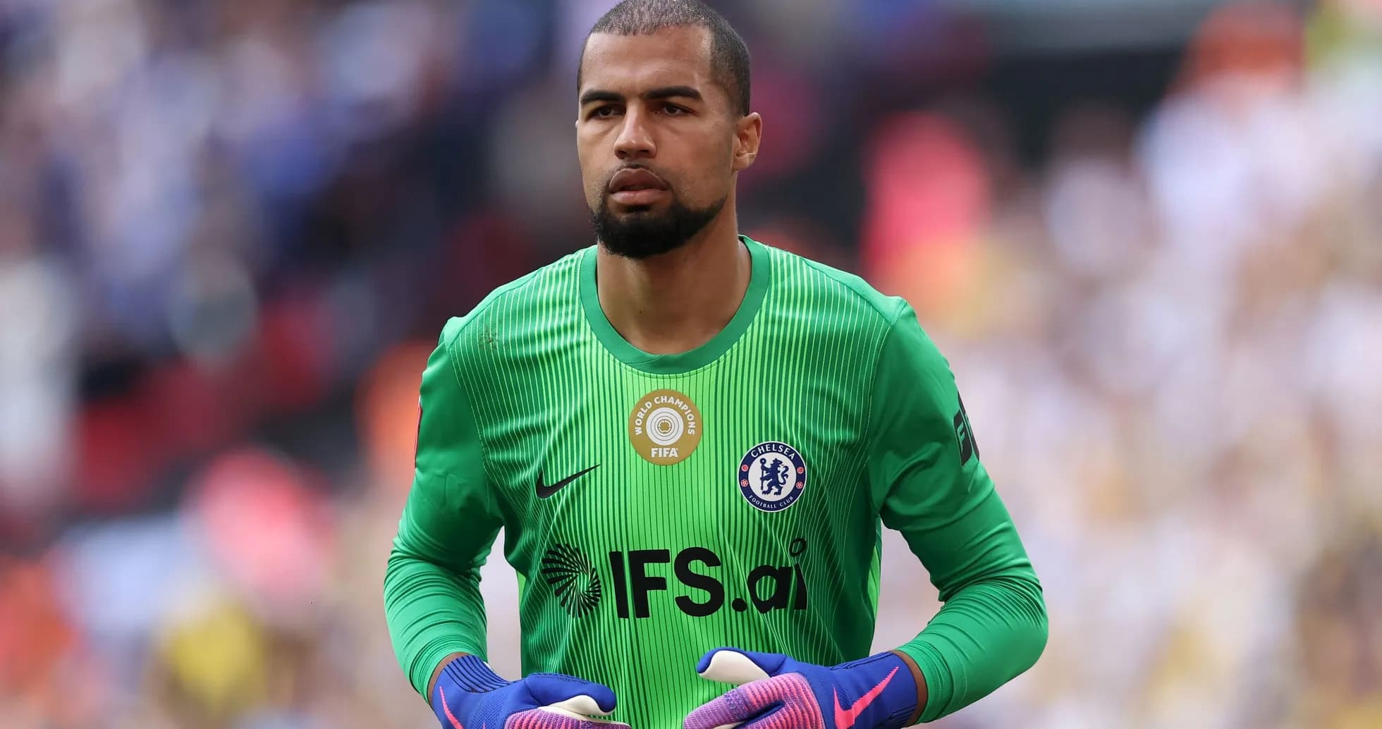 Goalkeeper in green jersey preparing for match Goalkeeper in green jersey preparing for match