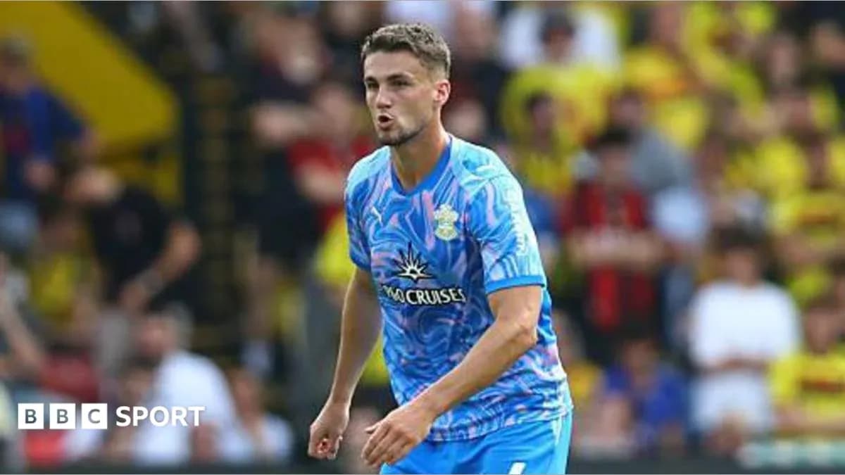 Player in blue jersey during match action Player in blue jersey during match action