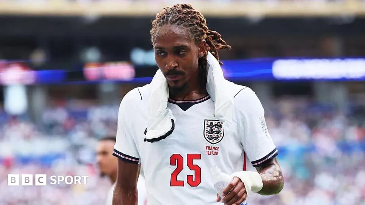 Player wearing England kit walking off the field Player wearing England kit walking off the field
