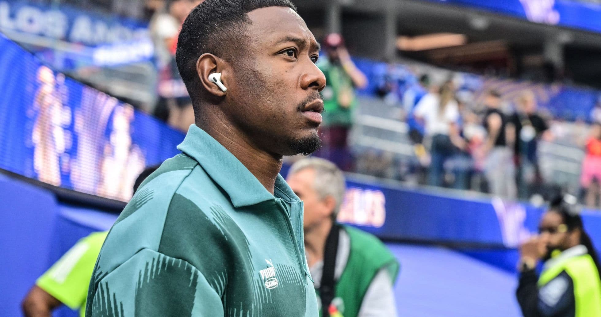 Player walking in team tracksuit before match Player walking in team tracksuit before match