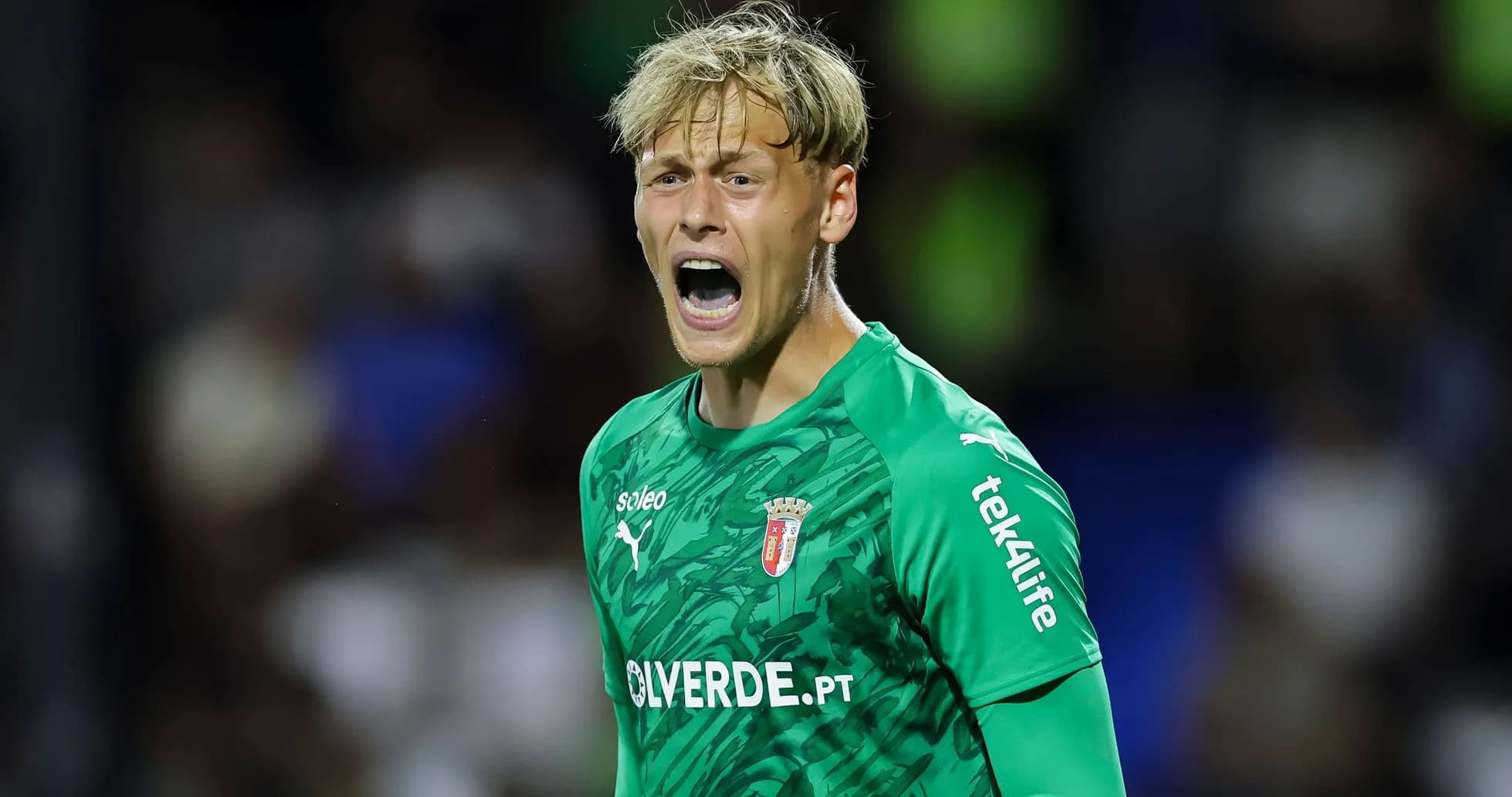 Goalkeeper yelling during a football match Goalkeeper yelling during a football match
