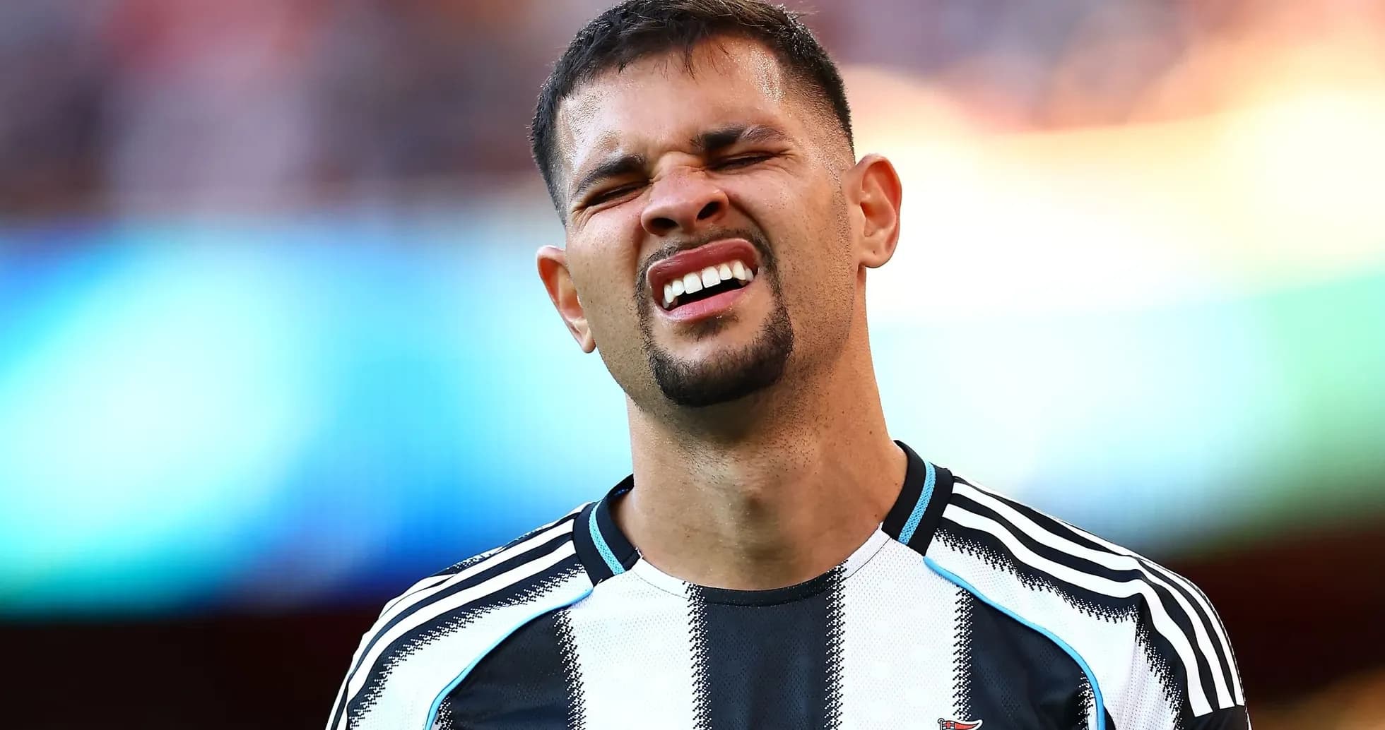 Player reacting during a match in Newcastle kit Player reacting during a match in Newcastle kit