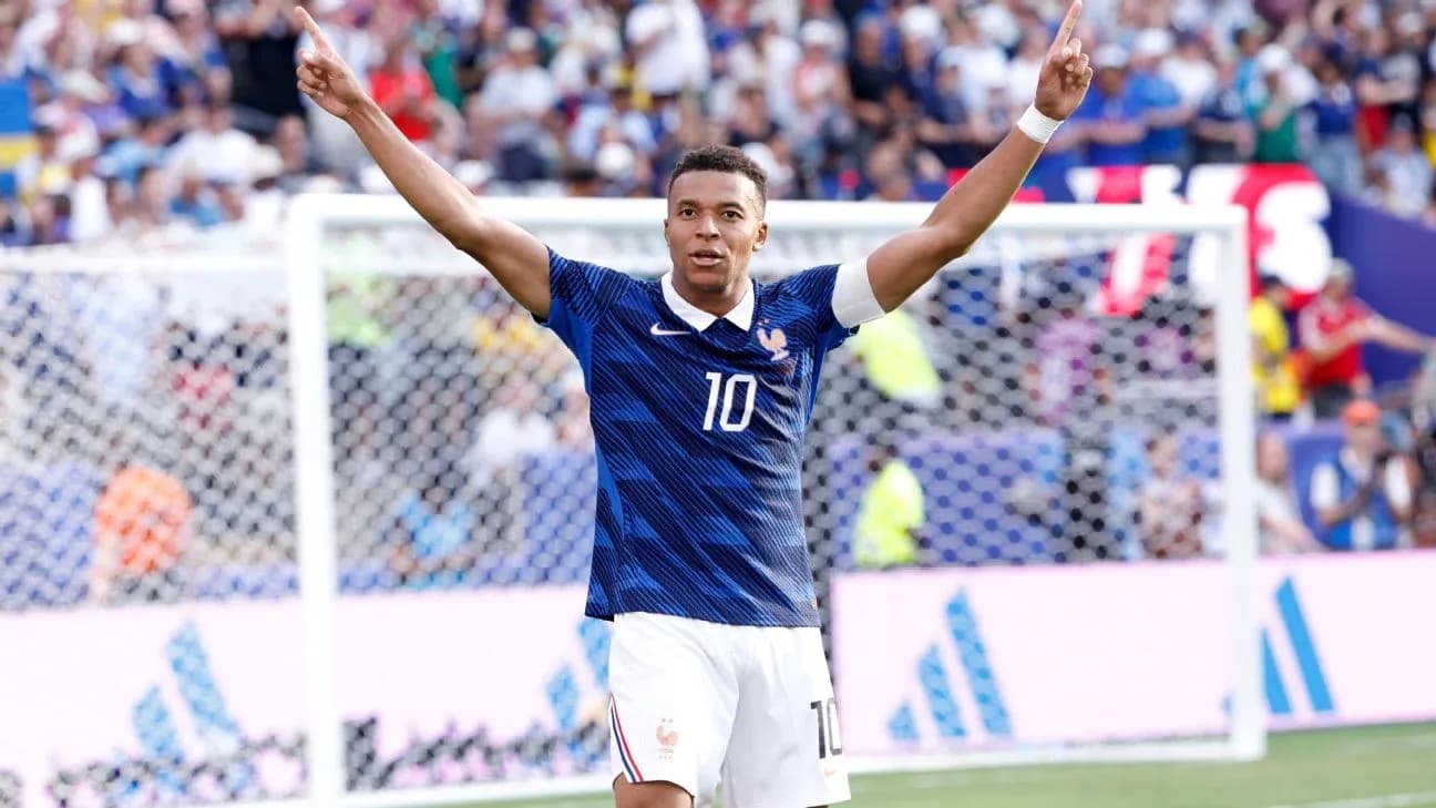 Kylian Mbappe celebrating a goal for France Kylian Mbappe celebrating a goal for France