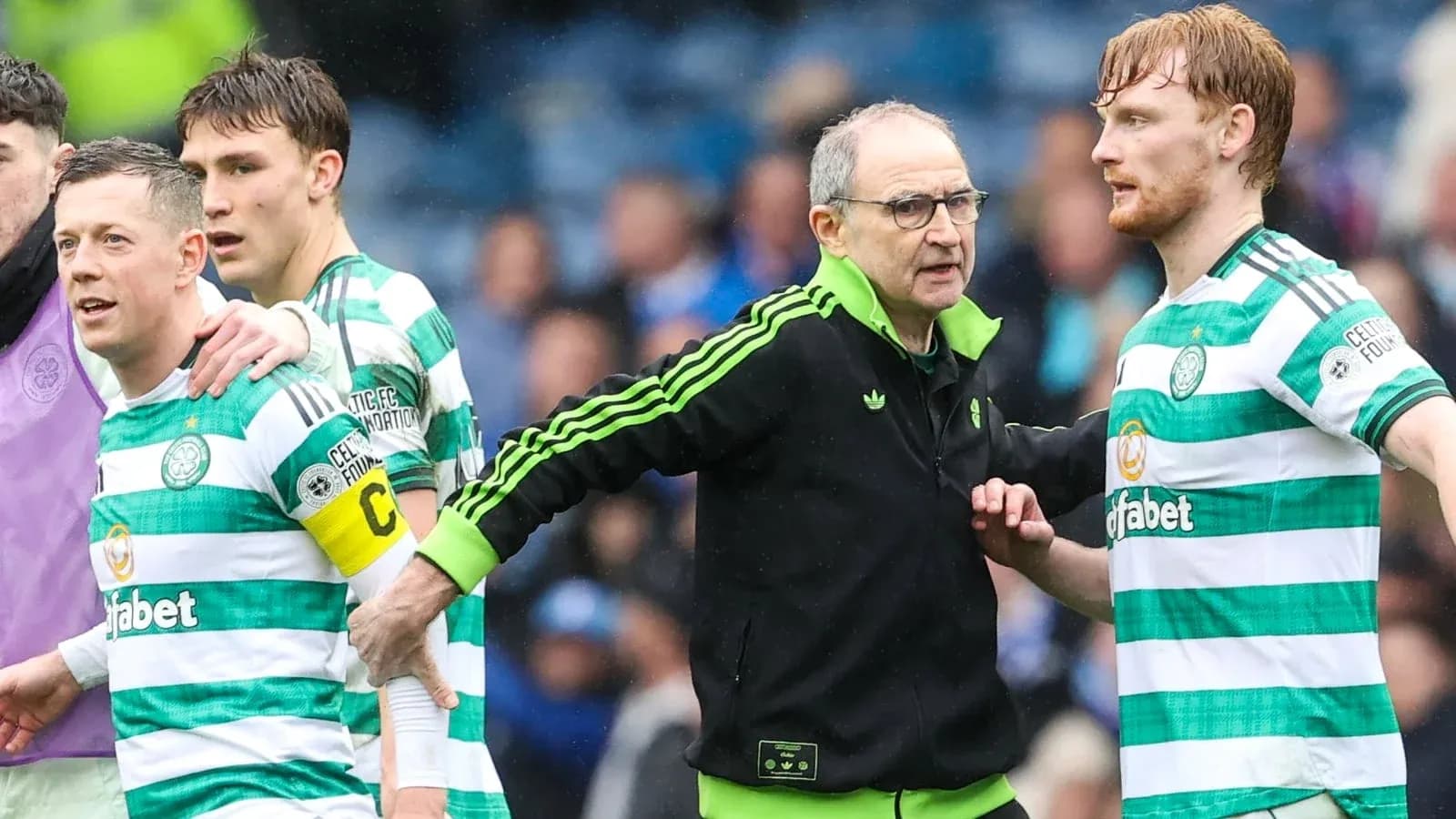Celtic players and manager interacting during match Celtic players and manager interacting during match