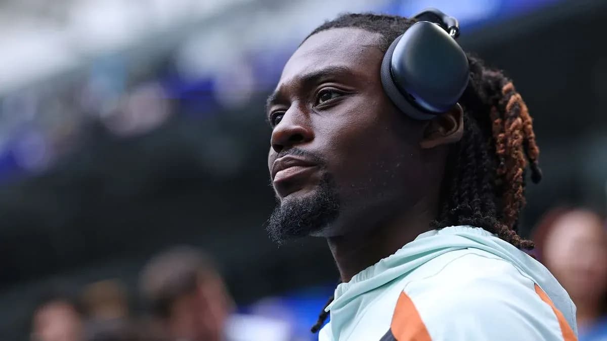 Player wearing headphones before the match Player wearing headphones before the match
