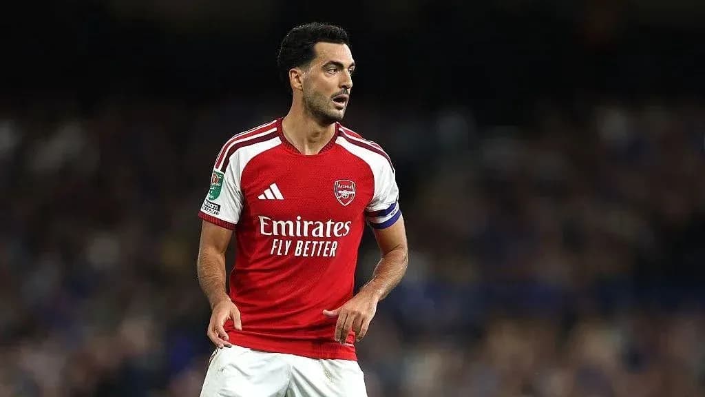 Arsenal player in red jersey during match Arsenal player in red jersey during match