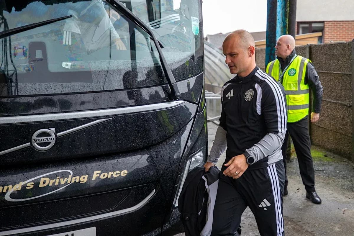 Team staff boarding bus in rainy weather Team staff boarding bus in rainy weather