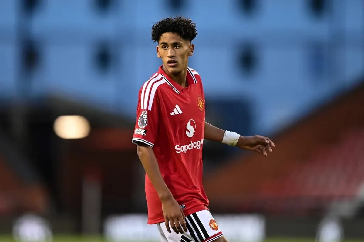 Player in Manchester United jersey on the field Player in Manchester United jersey on the field