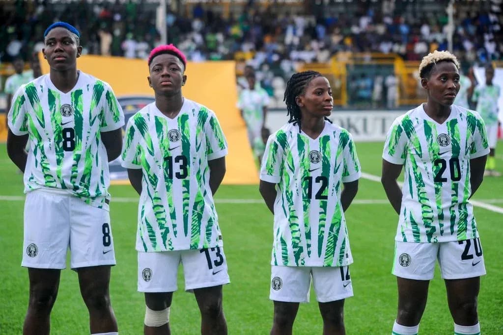 Four Nigerian players in team uniforms before match Four Nigerian players in team uniforms before match