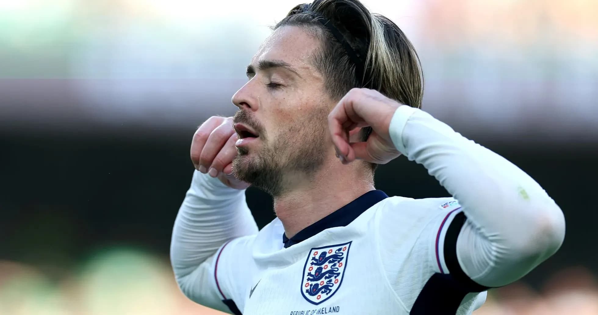 Player with closed eyes during match action Player with closed eyes during match action
