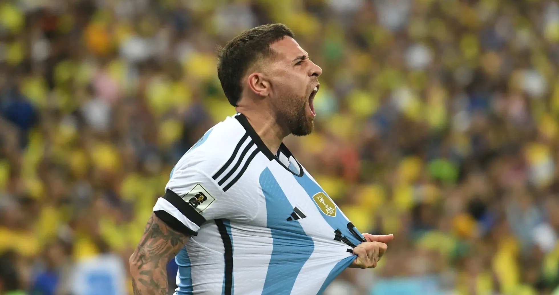 Player celebrating passionately in Argentina jersey Player celebrating passionately in Argentina jersey