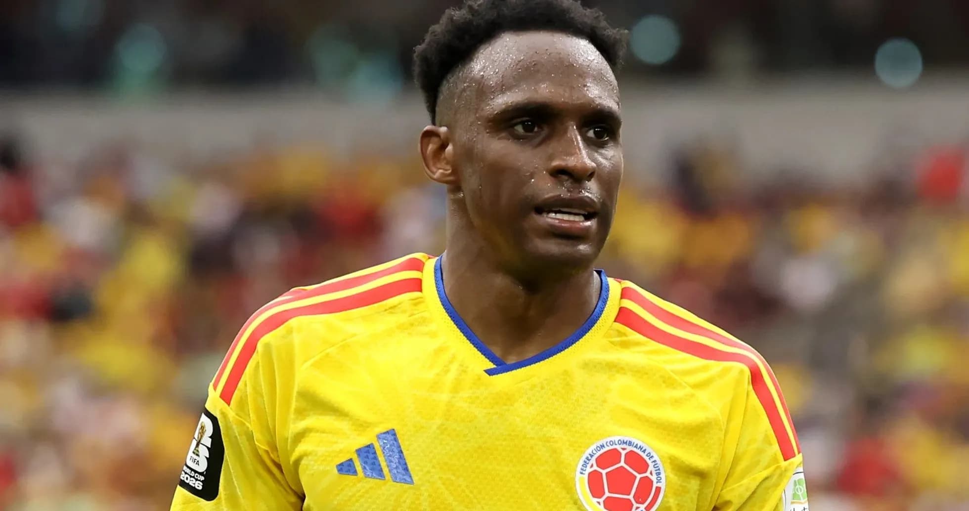 Player wearing Colombian national team jersey on field Player wearing Colombian national team jersey on field